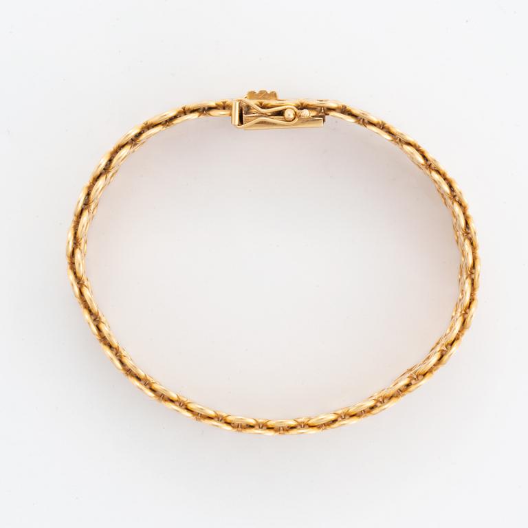 Armband, 18K guld, tät x-länk.