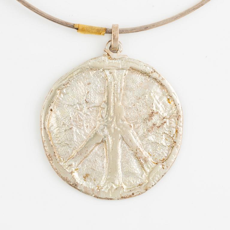 Lars Arby, three neck rings with pendants, silver, Gothenburg including 1977, 1978, and 1982.