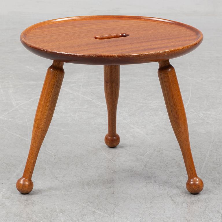 A mahogny stool, model 2156, by Josef Frank for Firma Svenskt Tenn.