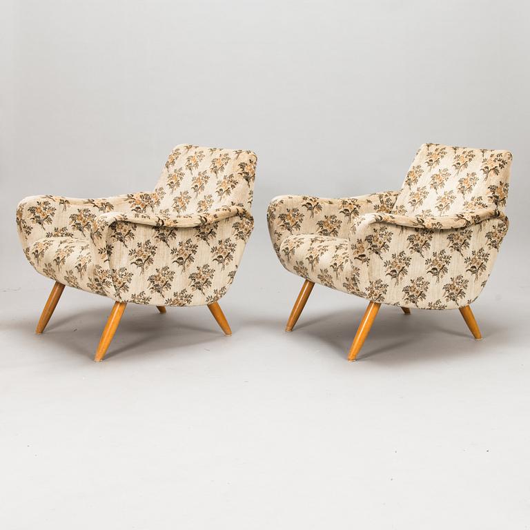 A pair of 1950s / 60s armchairs.