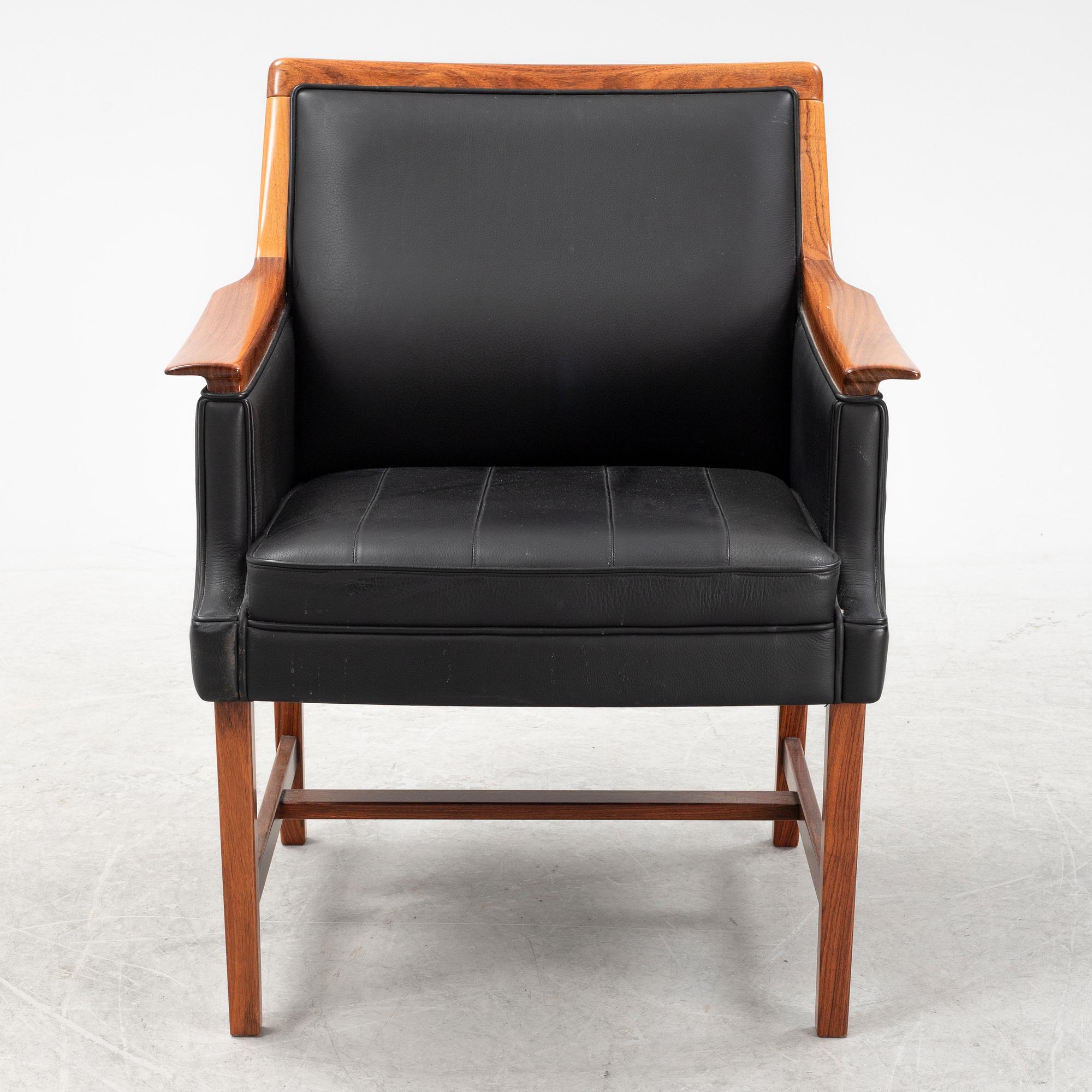 Torbjørn Afdal, a 'Minerva' rosewood desk and a chair, Bruksbo, Haug Snekkeri AS, Norway, 1960's.