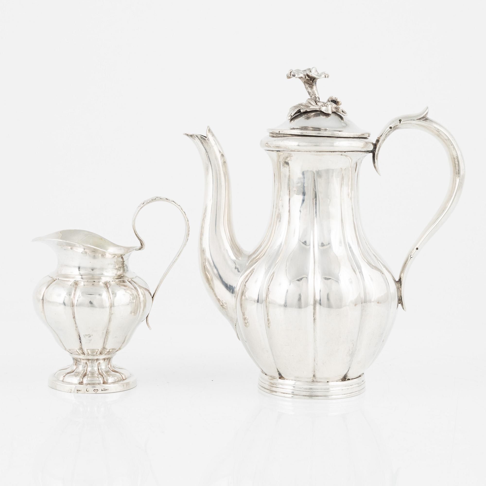 A 19th Century Swedish coffee pot and cream-jug, GT Folcker 1849 and G Möllenborg 1839, Stockholm. (2).