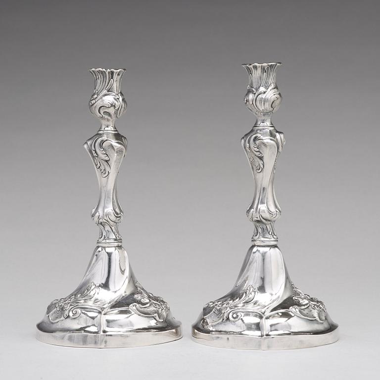 A pair of Swedish 18th century rococo silver candlesticks, mark of Jacob Lampa, Stockholm 1772.