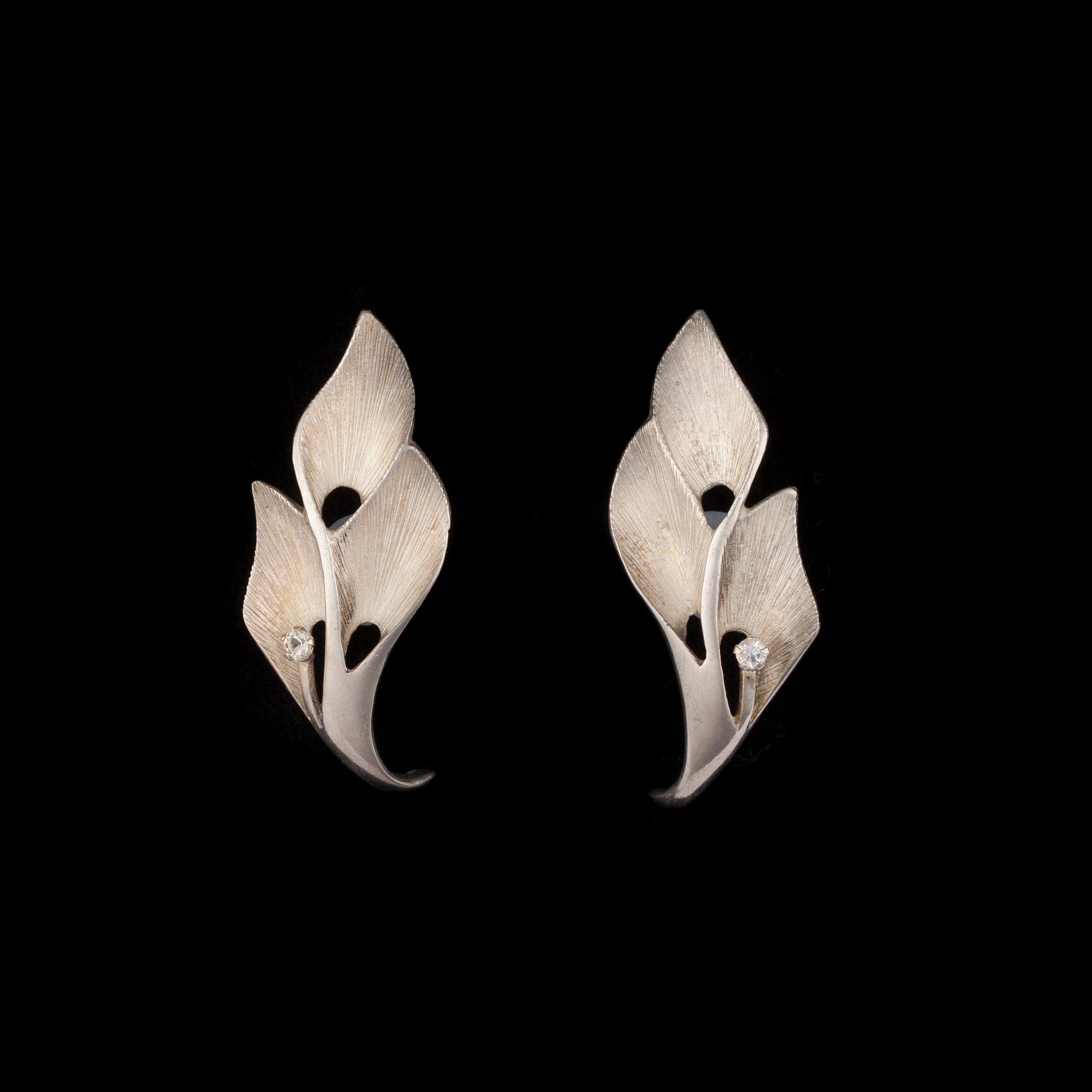 HALSSMYCKE, ARMSMYCKE, ÖRHÄNGEN och BROSCH, sterling silver. Sten & Laine 1989. Vikt tot. 80 g.