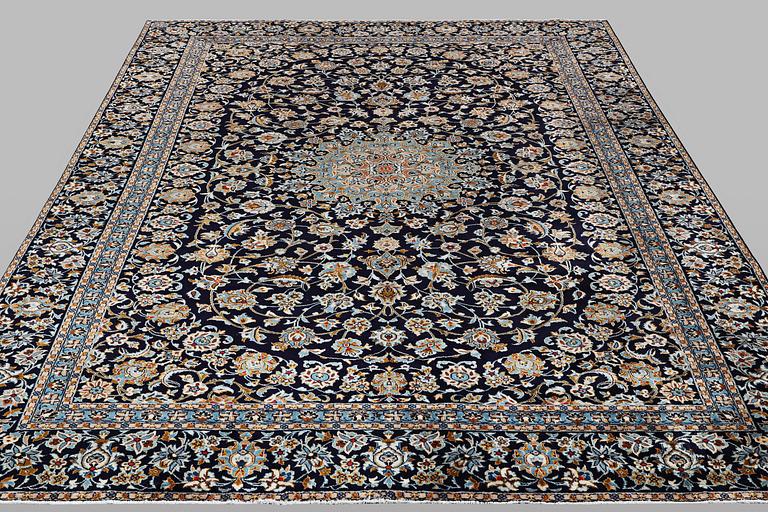 A carpet, Kashan, ca 391 x 286 cm.