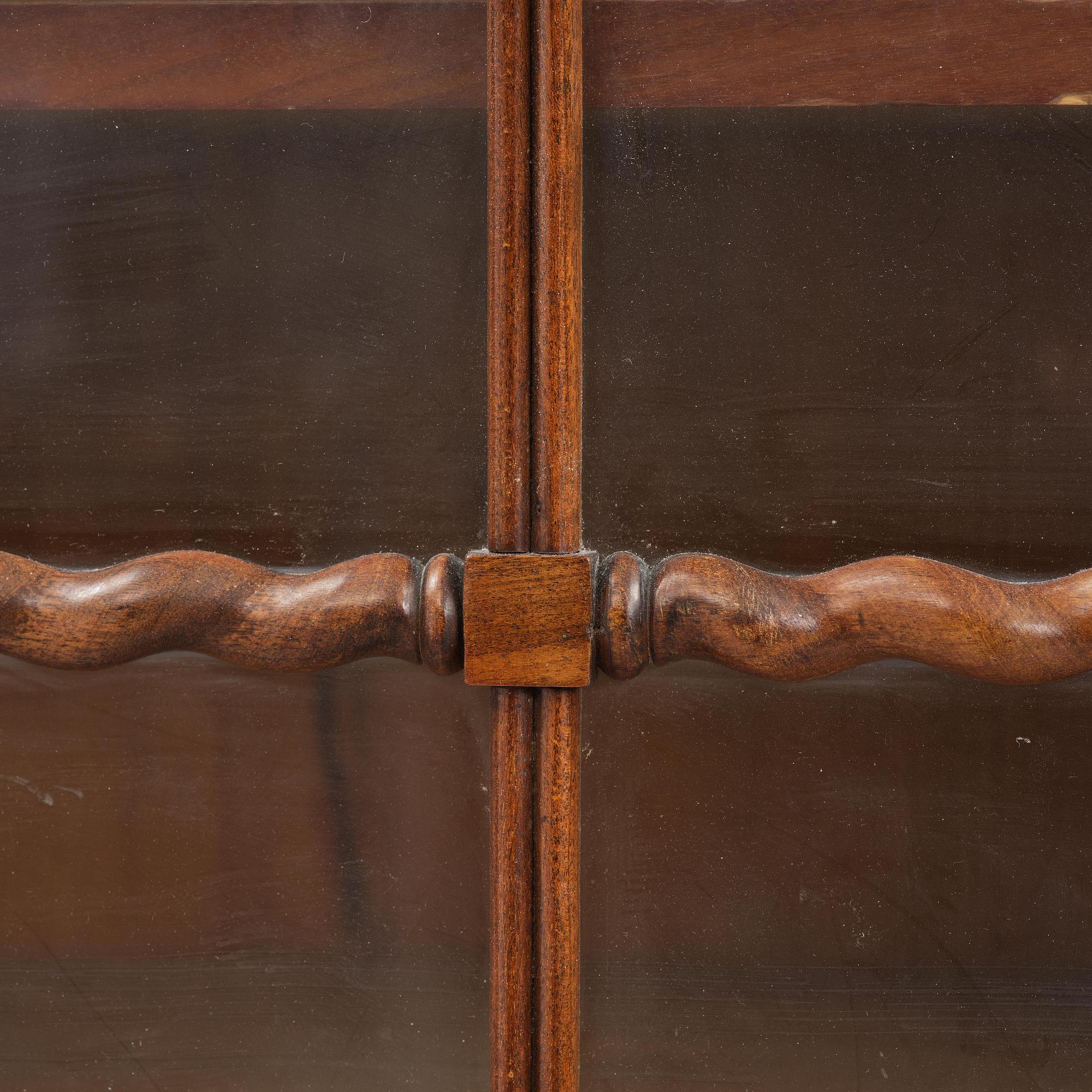 A pair of late Empire mahogany book cabinets, Stockholm, 1820/30's.
