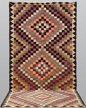 A carpet, Persian nomad Kilim, ca 290 x 150 cm.