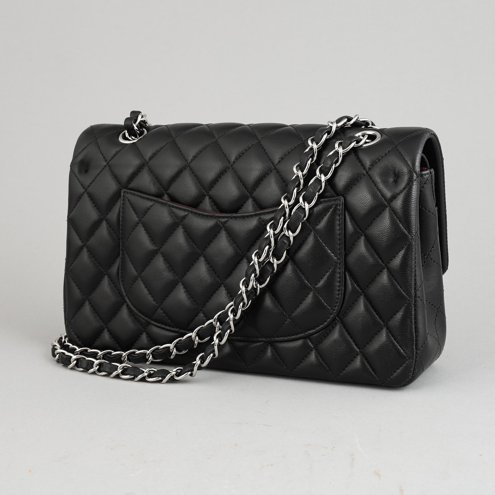 CHANEL, a 'Double Flap' quilted leather handbag, 2013-4.