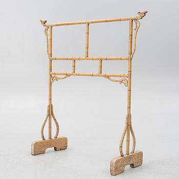 A Chinese bamboo and hardwood clothes rack, 20th century.