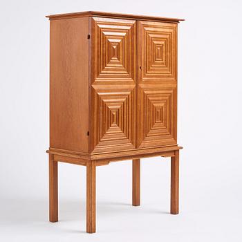 Oscar Nilsson, attributed to, a Swedish Modern oak cabinet, 1940s.