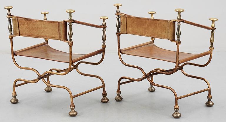 A pair of Italian neo-classical iron and brass
easy chairs, Italy mid 20th C.