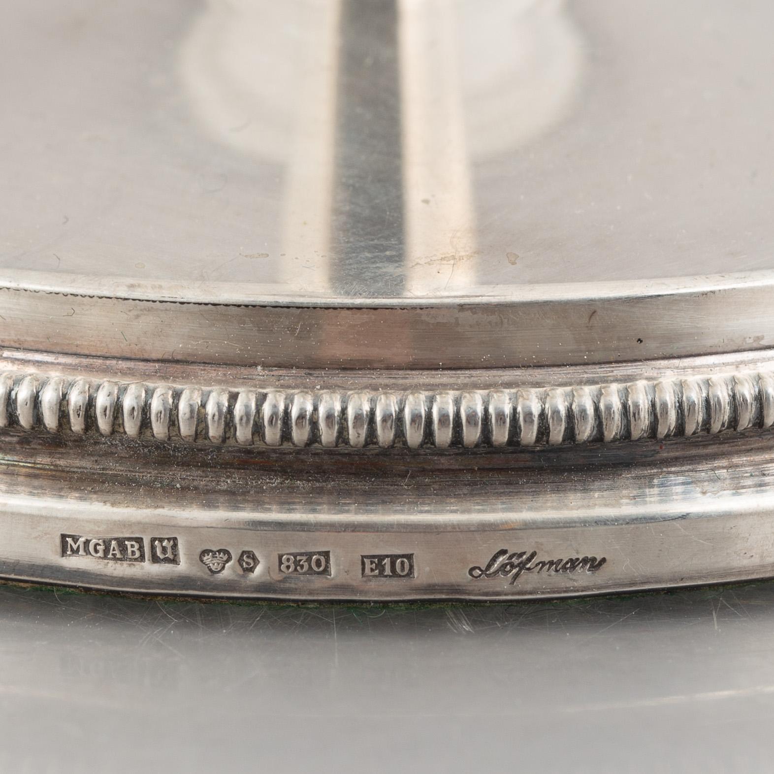 Two pairs of Swedish silver candlesticks, including Eric Löfman, MGAB, Uppsala 1979-1982.