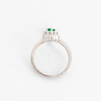 Emerald and brilliant cut diamond ring.