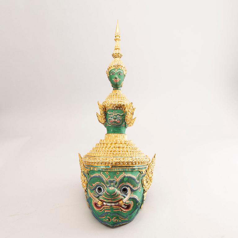 A set of two Thai headset and mask, 20th century.