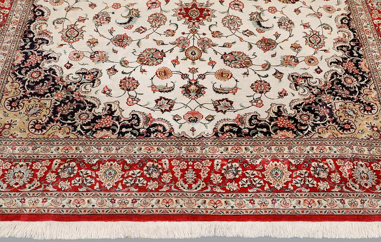 A silk Ghom carpet, 295 x 195 cm.