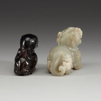 Two Chinese stone figures of mythical beasts.