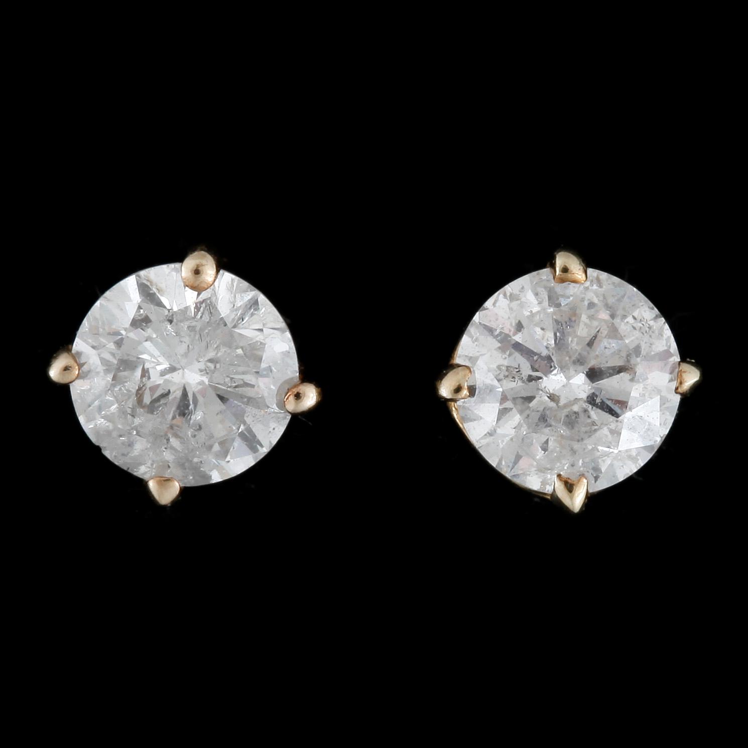 ÖRHÄNGEN, 1 par, 14 k guld, solitära briljantslipade diamanter tot 0.72 ct.