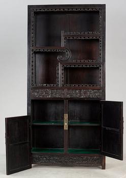 A Chinese hardwood cabinet, early 20th Century.
