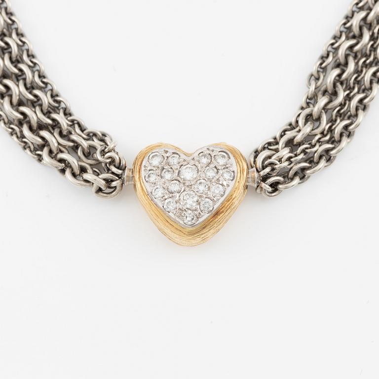 Necklace, Ole Lynggaard, with heart-shaped clasp in 18K gold set with brilliant-cut diamonds, chain in silver with four strands.