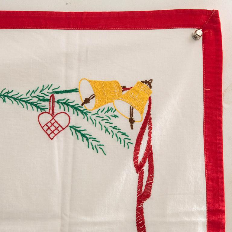 A collection of Christmas tablecloths 12 pcs first half/mid 20th century.