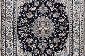 A rug, Nain, part silk, ca 198 x 144 cm.