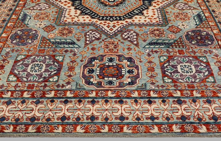 An Oriental carpet, c. 296 x 249 cm.