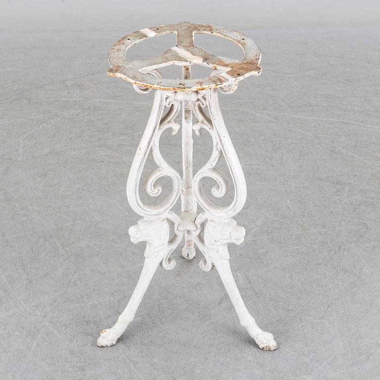 a late 20th century cast iron garden table.