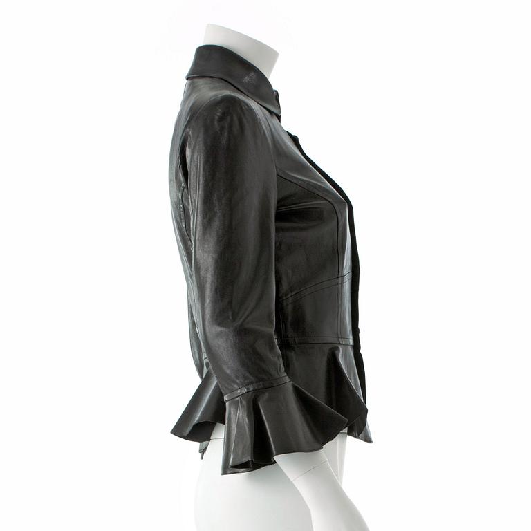 RALPH LAUREN, a black leather jacket.