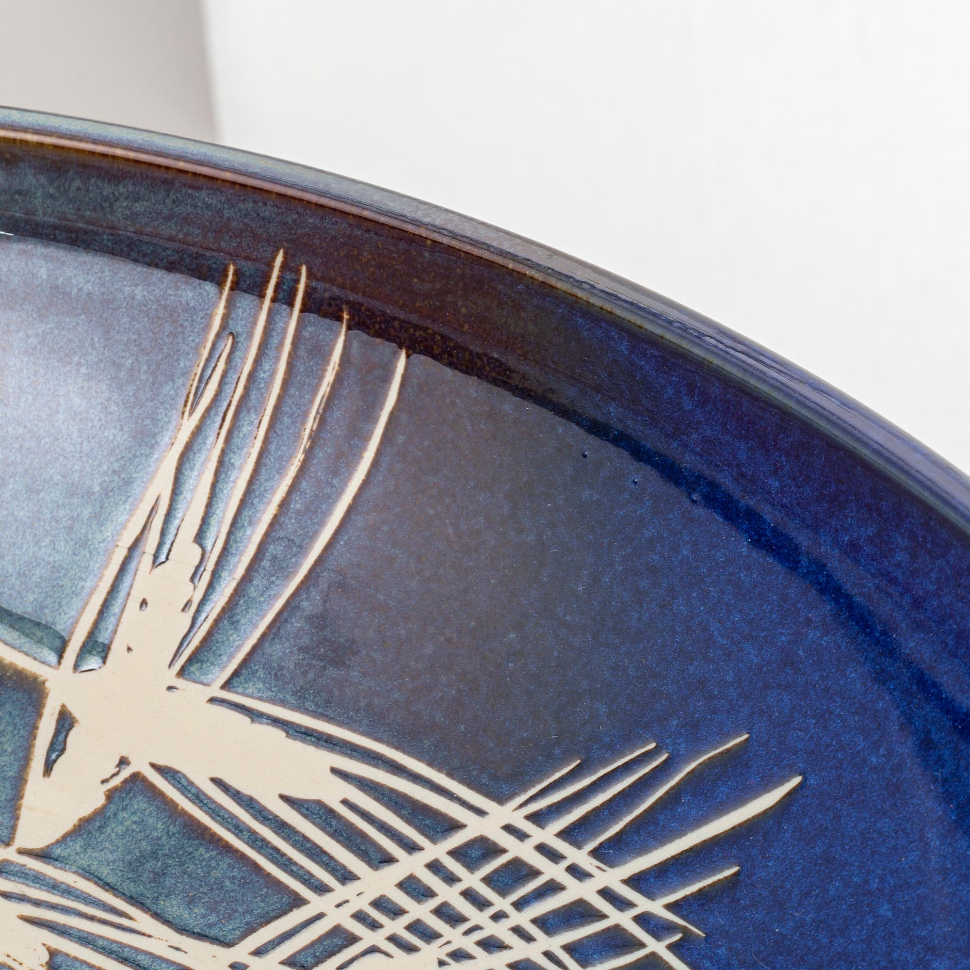 JACKIE LYND, a large stoneware dish, Rörstrand.