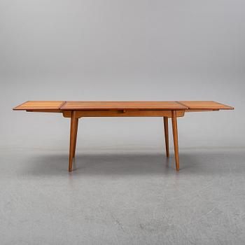 Hans J Wegner, a teak dining table, Andreas Tuck, Denmark.