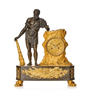 114. An Empire ormolu and patinated bronze mantel clock, circa 1820.