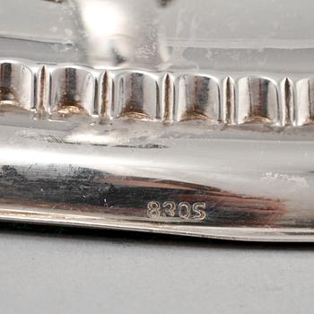 LJUSSTAKAR, ett par, silver, omkring 1900-talets mitt.