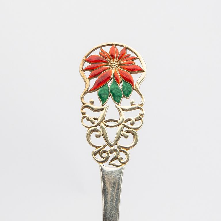 Anton Michelsen, Christmas cutlery, 21 pieces, gilded sterling silver and enamel, Denmark total weight 888 grams.