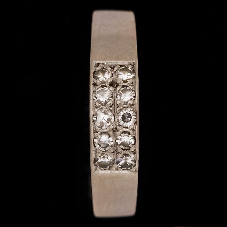 RING, 18k vitguld med åttkantsslipade diamanter tot ca0,20ct. Cedstam, Stockholm, 1981. Vikt 3,4g.