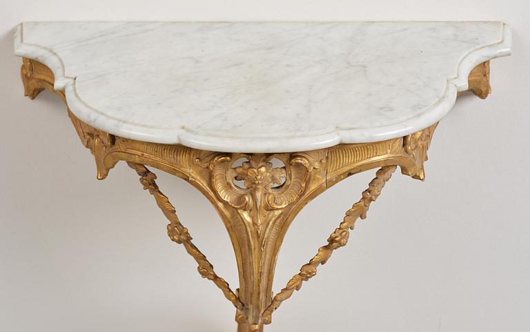 A rococo giltwood and marble console table, Stockholm, later part 18th century.
