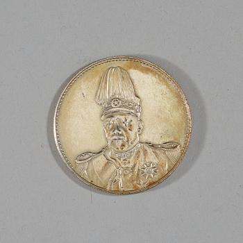 A box with five silver coins, Republic, early 20th Century.