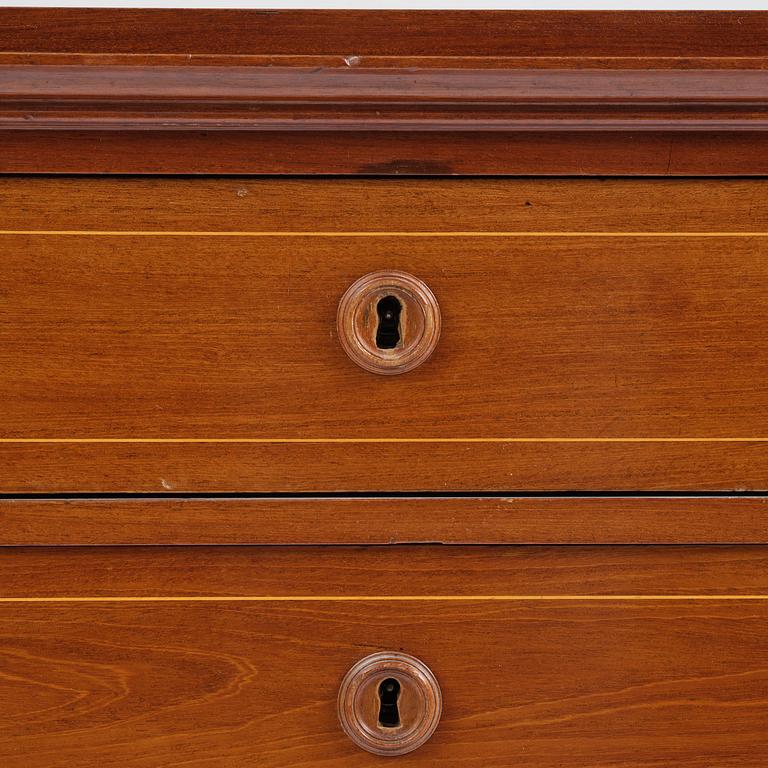 A late Gustavian mahogany writing commode in the manner of I. Löfgren, Stockholm circa 1800.