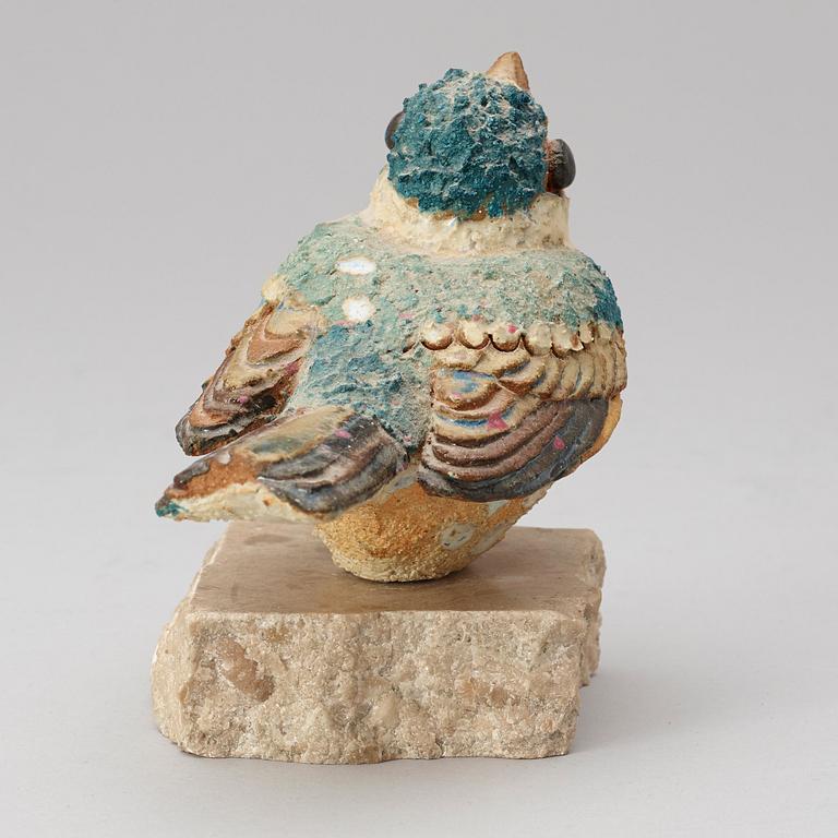 A Tyra Lundgren stoneware figure of a bird.