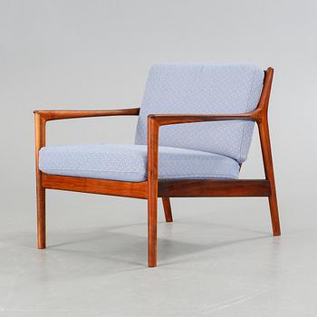 A mid 20th century "USA 75" chair, designed by Folke Ohlsson for Dux Möbel AB 1963.
