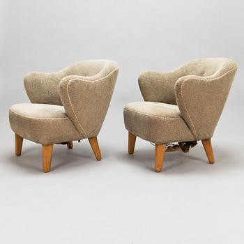 Flemming Lassen, a pair of armchairs manufactured by Asko 1952-1956.