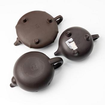 A group of four Chinese brown yixing teapots, 1980/90s.