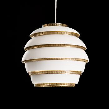 A Beehive A331 ceiling light manufactured by Valaistustyö. Designed in 1953.