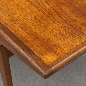 A 1960s teak coffee table.