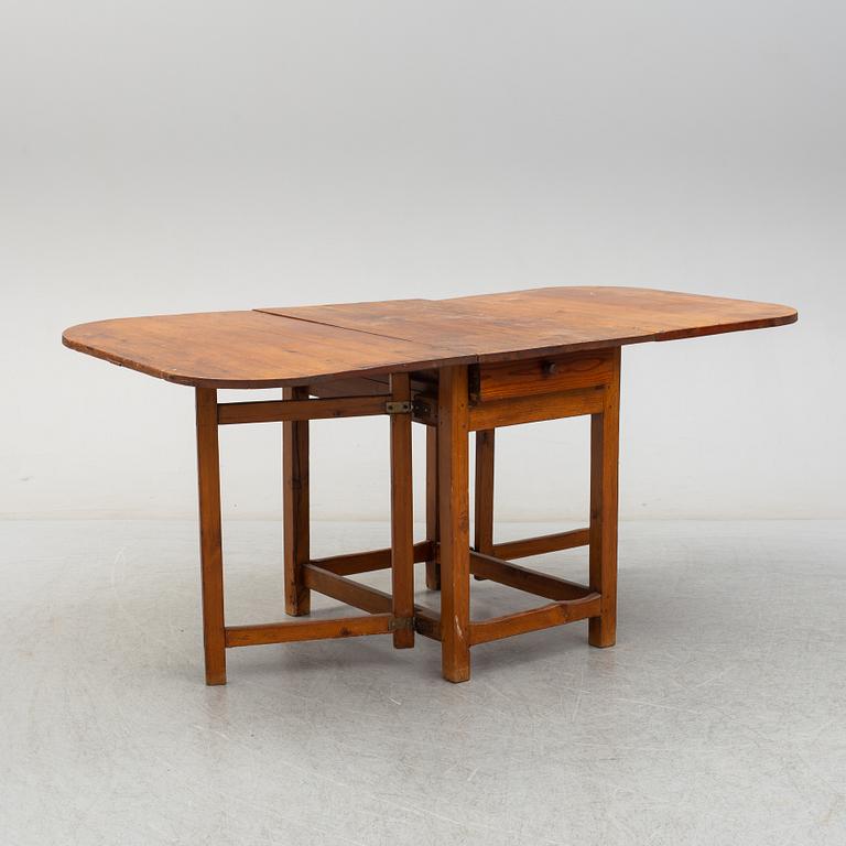 A 19th century gate-leg table.