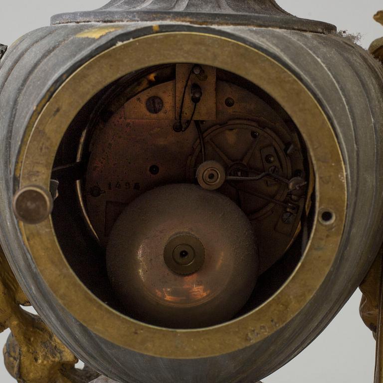An end of the 20th century metal case mantle clock.