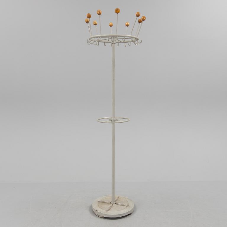 A painted steel coat hanger, mid 20th Century.