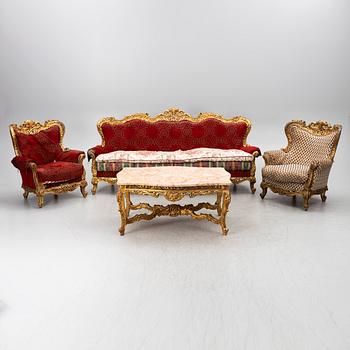 A four-piece gilt gesso rococo-style salon suite, first part 20th century.