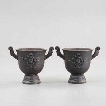 A pair of Ivar Johnsson 'Faun' cast iron jardinières, Näfveqvarn, Sweden.