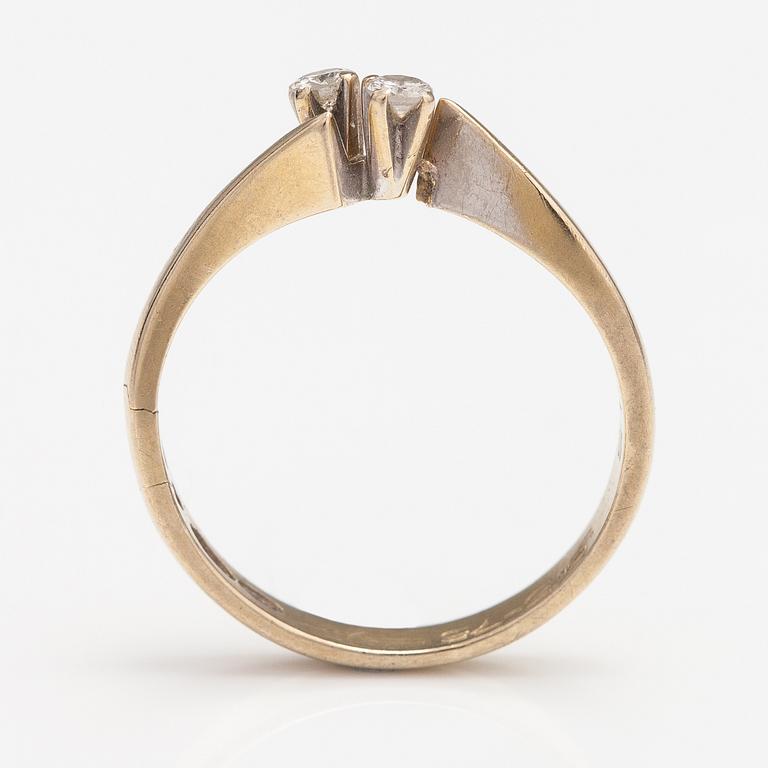 An 18K gold ring with diamonds ca. 0.12 ct in total. Finland 1974.