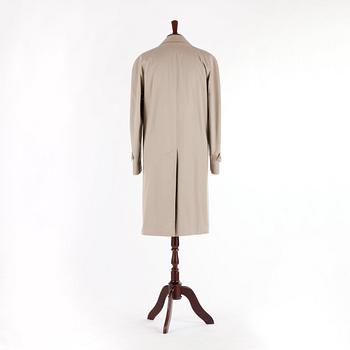 BURBERRY, a men's beige cottonblend trenchcoat.